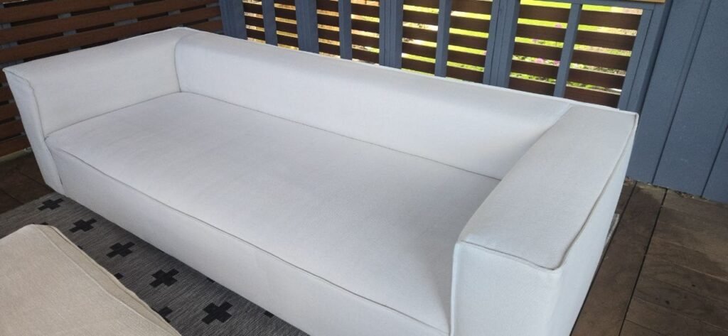 Clean white patio sofa after JenyClean hot-water extraction upholstery cleaning in Kirkland, WA