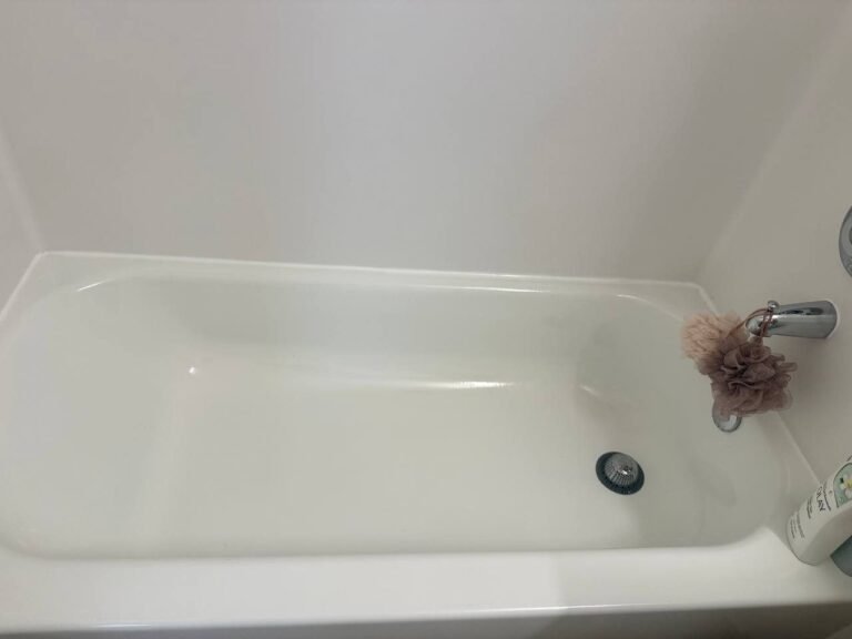 Clean white bathtub with chrome spout after JenyClean same-day house cleaning in Renton, WA