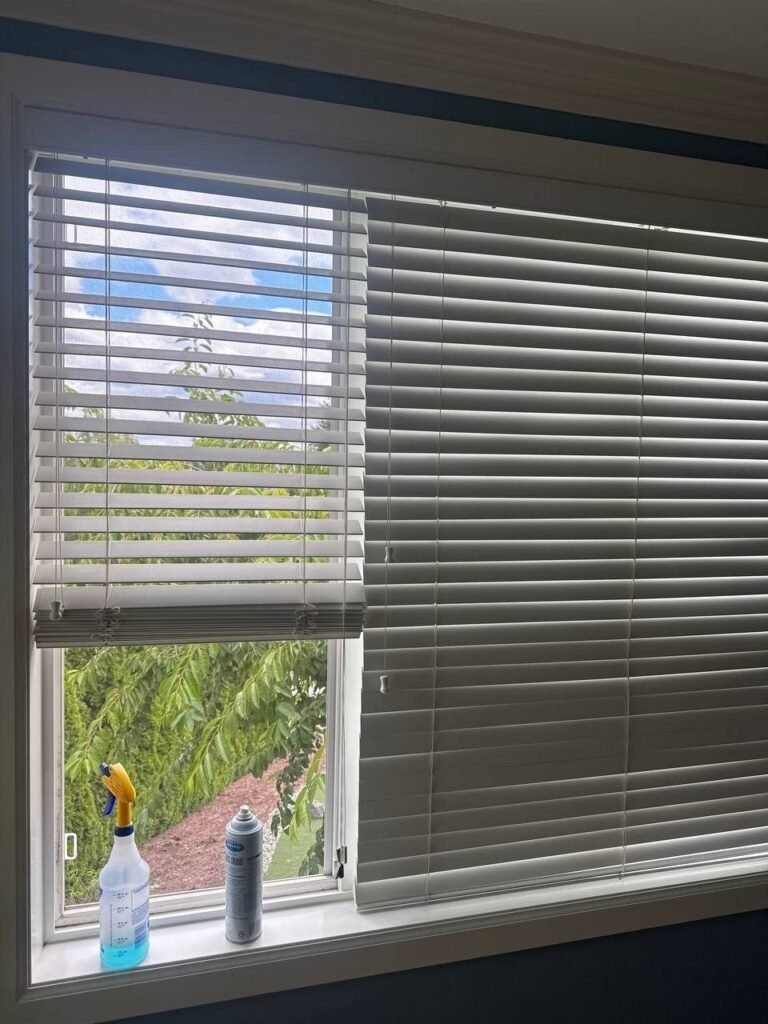 White horizontal blinds and a clean window during JenyClean move-in cleaning of a large home in Sammamish, WA